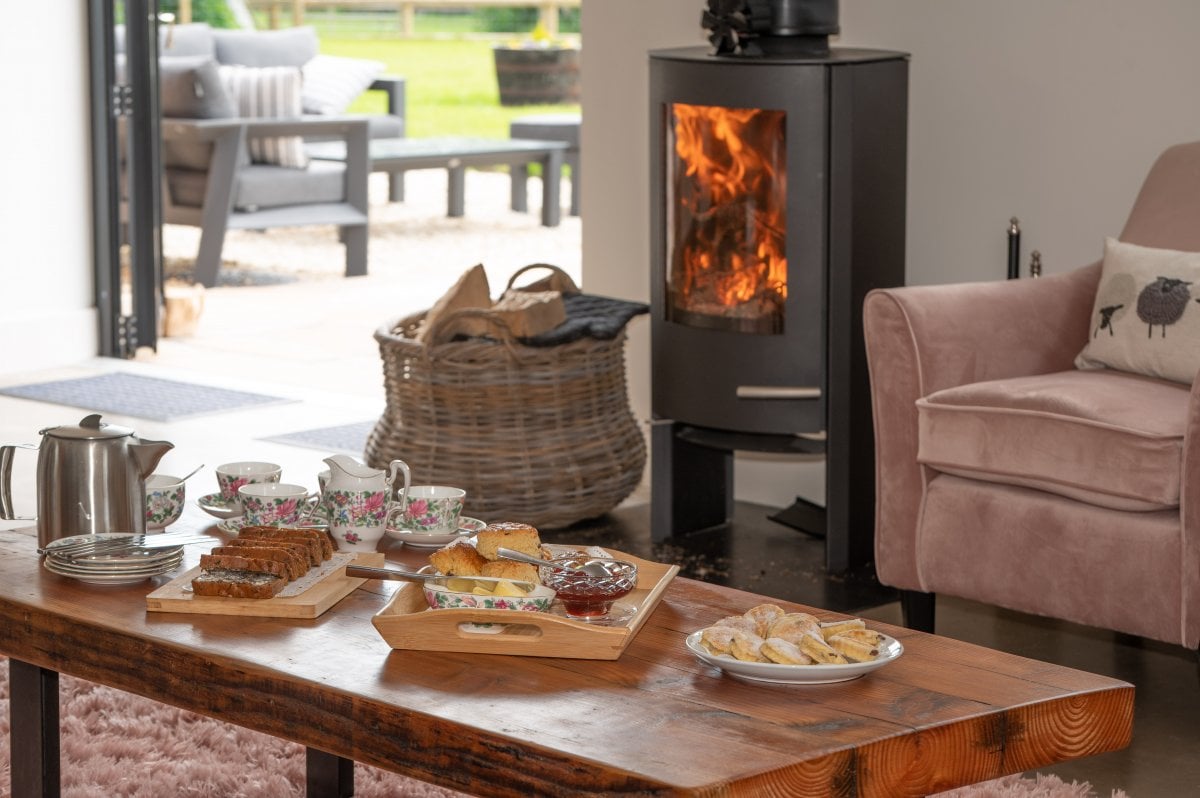 Old Cider Press Barn - cosy wood burner in the sitting area